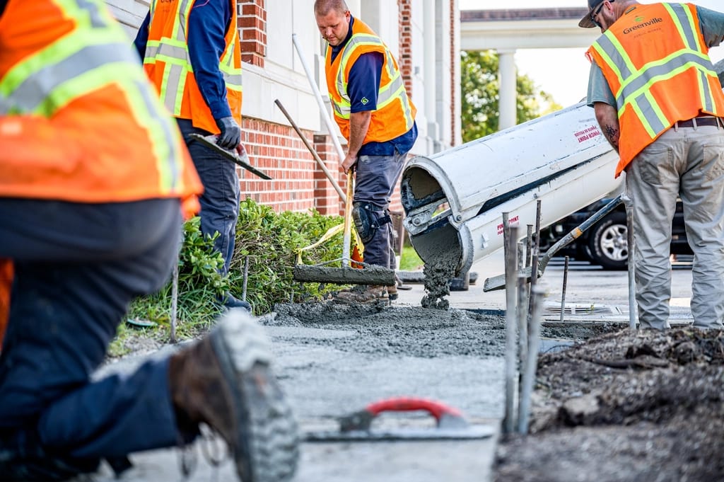 A concrete pour underway on a construction site